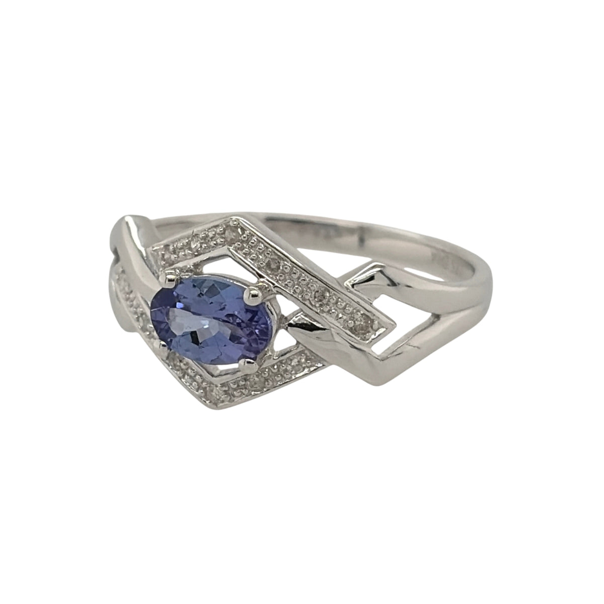 New 9ct White Gold Diamond &amp; Tanzanite Ring in various sizes with the approx weight 2 grams. There is approximatley 0.06ct of diamond content in the ring has approximate clarity i2-i3 and colour H - I. The oval tanzanite stone is 6mm by 4mm