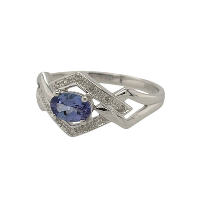 New 9ct White Gold Diamond &amp; Tanzanite Ring in various sizes with the approx weight 2 grams. There is approximatley 0.06ct of diamond content in the ring has approximate clarity i2-i3 and colour H - I. The oval tanzanite stone is 6mm by 4mm