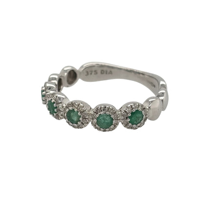 New 9ct White Gold Diamond &amp; Emerald Flower Band Ring in various sizes with the approx weight 2.40 grams. There is approximatley 0.20ct of diamond content in the ring has approximate clarity i2-i3 and colour H - I