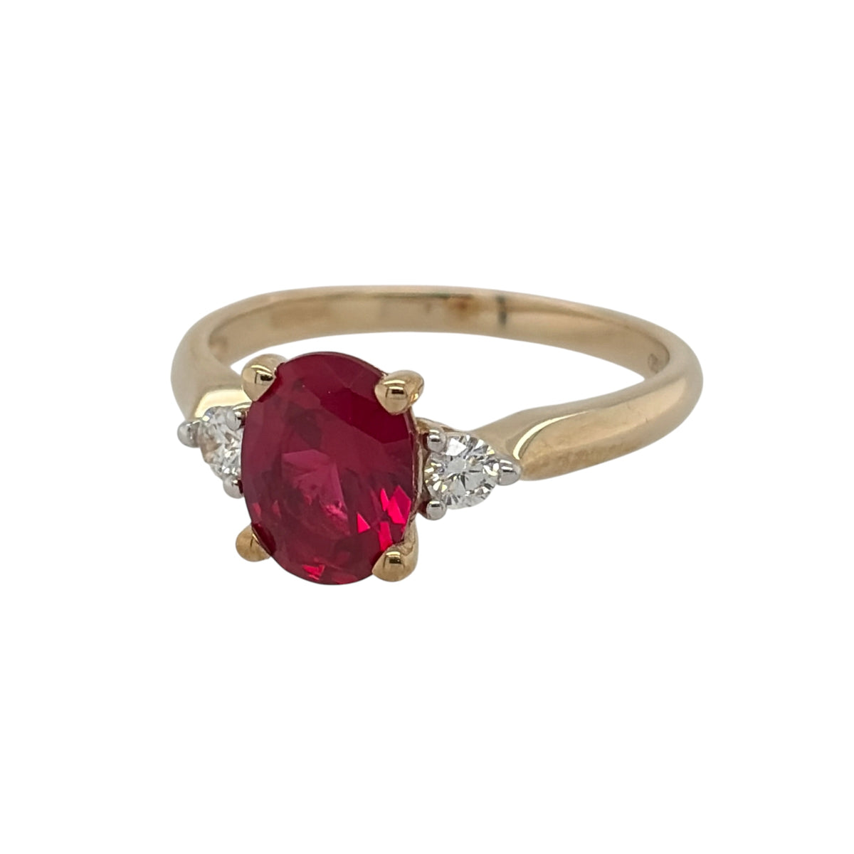 New 9ct Gold Lab Grown Diamond &amp; Lab Grown Ruby Trilogy Ring in various sizes with the approx weight 2.45 grams. There is approximatley 0.16ct of lab grown diamond content in the ring has approximate clarity i2 and colour J. The oval lab grown ruby is 8mm by 6mm