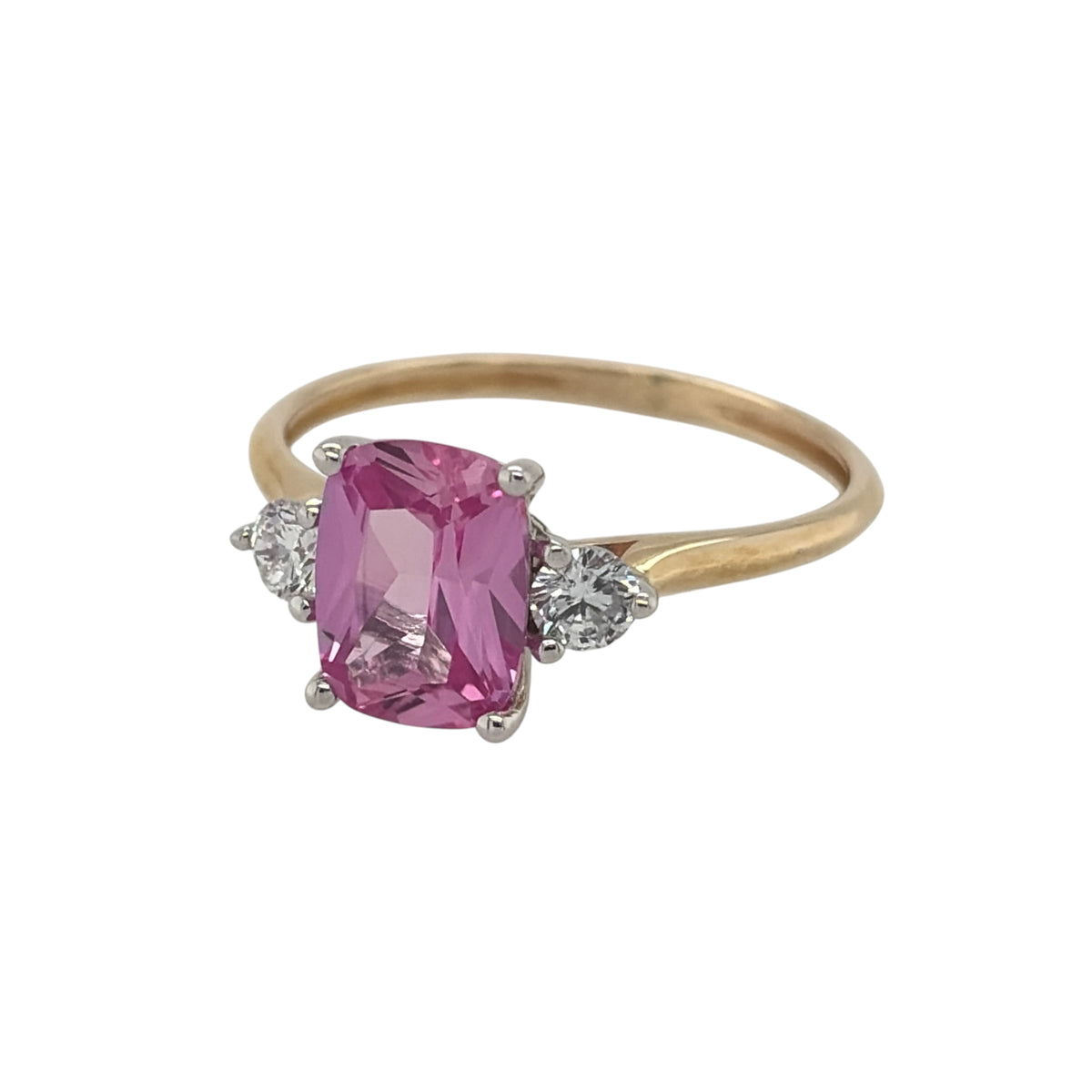 New 9ct Gold Lab Grown Diamond &amp; Lab Grown Pink Sapphire Trilogy Ring in various sizes with the approx weight 1.80 grams. There is approximatley 0.16ct of lab grown diamond content in the ring has approximate clarity i2 and colour J. The elongated cushion lab grown pink sapphire stone is 8mm by 6mm