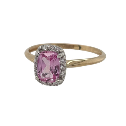 New 9ct Gold Lab Grown Diamond &amp; Lab Grown Pink Sapphire Elongated Cushion Cluster Ring in various sizes with the approx weight 1.60 grams. There is approximatley 0.11ct of lab grown diamond content in the ring has approximate clarity i2 and colour J. The elongated cushion lab grown pink sapphire stone is 7mm by 5mm