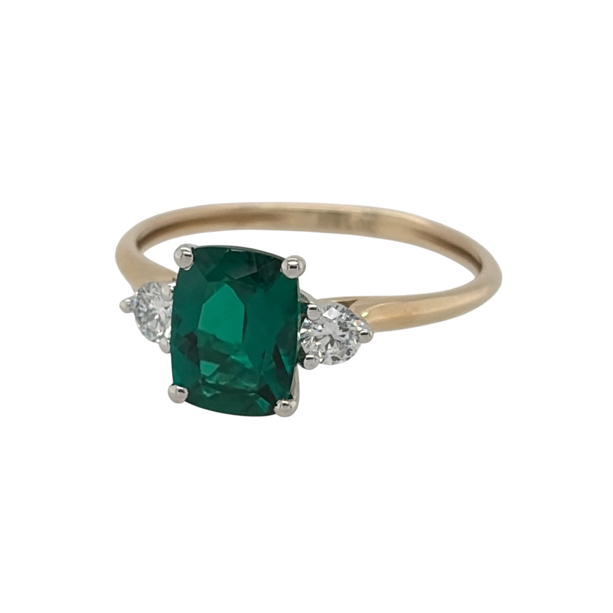 New 9ct Gold Lab Grown Diamond &amp; Lab Grown Emerald Trilogy Ring in various sizes with the approx weight 1.80 grams. There is approximatley 0.16ct of lab grown diamond content in the ring has approximate clarity i2 and colour J. The elongated cushion lab grown emerald stone is 8mm by 6mm