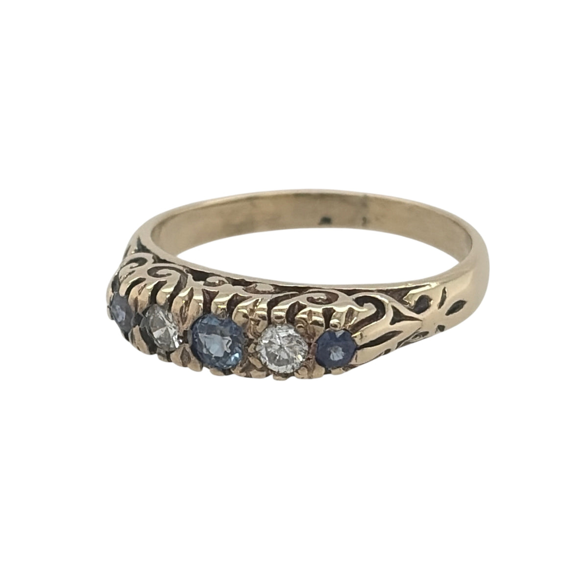 This pre-owned 9ct yellow gold diamond and sapphire band ring is a classic gemstone design, featuring sapphire and diamond detailing across the front.

Design: Featuring a traditional gemstone band design, this ring combines sapphires and diamonds across the front in warm 9ct yellow gold.
Material: Made from 9-carat yellow gold.
Gemstone Detail: Set with sapphire and diamond detailing across the front of the ring.
Ring Detail: The front of the band measures approximately 4mm wide.