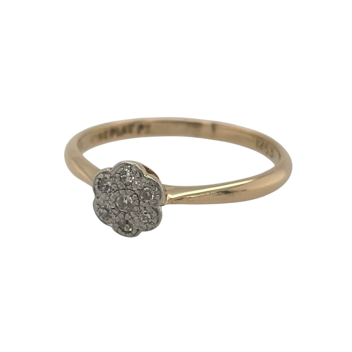 This pre-owned 18ct yellow gold and platinum diamond flower cluster ring is a classic two-tone design, featuring diamonds arranged in a decorative floral cluster.

Design: Featuring a flower-shaped cluster design, this ring combines warm 18ct yellow gold with a contrasting platinum diamond setting for a traditional two-tone appearance.
Material: Made from 18-carat yellow gold and platinum.
Gemstone Detail: Set with multiple diamonds arranged in a flower-style cluster.