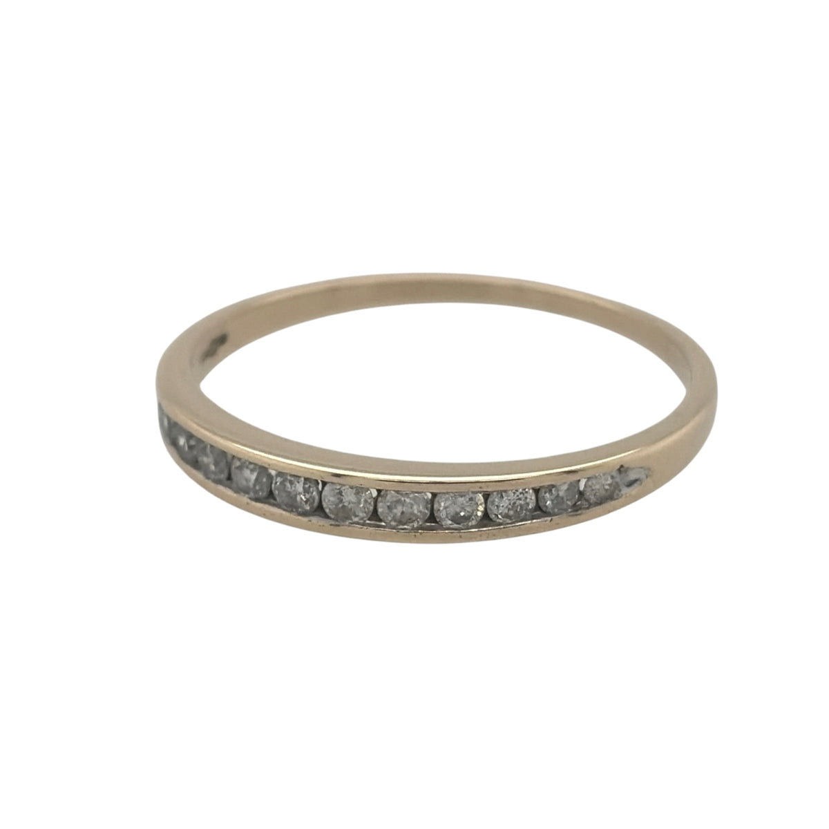 This pre-owned 9ct yellow gold diamond band ring is a classic design, featuring diamond detailing set across the front of the band.

Design: Featuring a timeless diamond band design, this ring has multiple diamonds arranged across the front and finished in warm 9ct yellow gold.
Material: Made from 9-carat yellow gold.
Gemstone Detail: Set with approximately 0.25ct of diamond content in total.