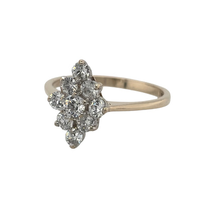 This pre-owned 9ct yellow gold cubic zirconia cluster ring is a classic dress ring, featuring multiple cubic zirconia stones arranged across the front.

Design: Featuring a traditional cluster design, this ring has multiple cubic zirconia stones grouped together to create a decorative centrepiece in warm 9ct yellow gold.
Material: Made from 9-carat yellow gold.
Gemstone Detail: Set with multiple cubic zirconia stones within the cluster design.
