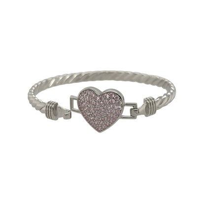 This new 925 sterling silver pink cubic zirconia set children’s heart twisted bangle is a pretty design, featuring a heart centrepiece with colourful stone detailing.

Design: Featuring a twisted bangle design with a heart centrepiece, this children’s bangle has a polished silver finish with pink cubic zirconia detailing.
Material: Made from 925 sterling silver.
Gemstone Detail: Set with pink cubic zirconia stones across the heart design.
