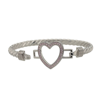 This new 925 sterling silver pink cubic zirconia set open heart twisted bangle is a stylish design, featuring an open heart centrepiece with colourful stone detailing.

Design: Featuring a twisted bangle design with an open heart centrepiece, this bangle has a polished silver finish with pink cubic zirconia detailing.
Material: Made from 925 sterling silver.
Gemstone Detail: Set with pink cubic zirconia stones across the open heart design.