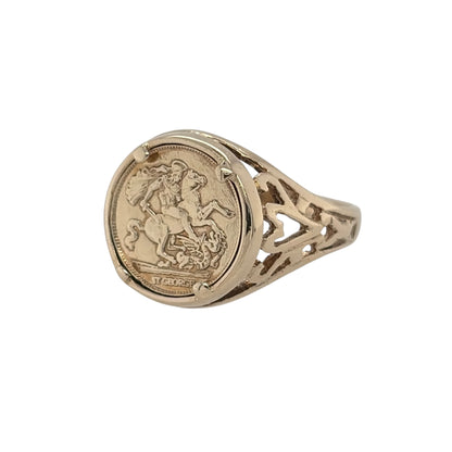 This pre-owned 9ct yellow gold George and the Dragon coin ring is a traditional design, featuring the iconic George and the Dragon motif across the front.

Design: Featuring a coin-style centrepiece displaying the George and the Dragon motif, this ring has a traditional appearance finished in warm 9ct yellow gold.
Material: Made from 9-carat yellow gold.
Ring Detail: The front of the ring measures approximately 12mm high.
Size & Weight: Ring size H to I. Total weight 2.40 grams.