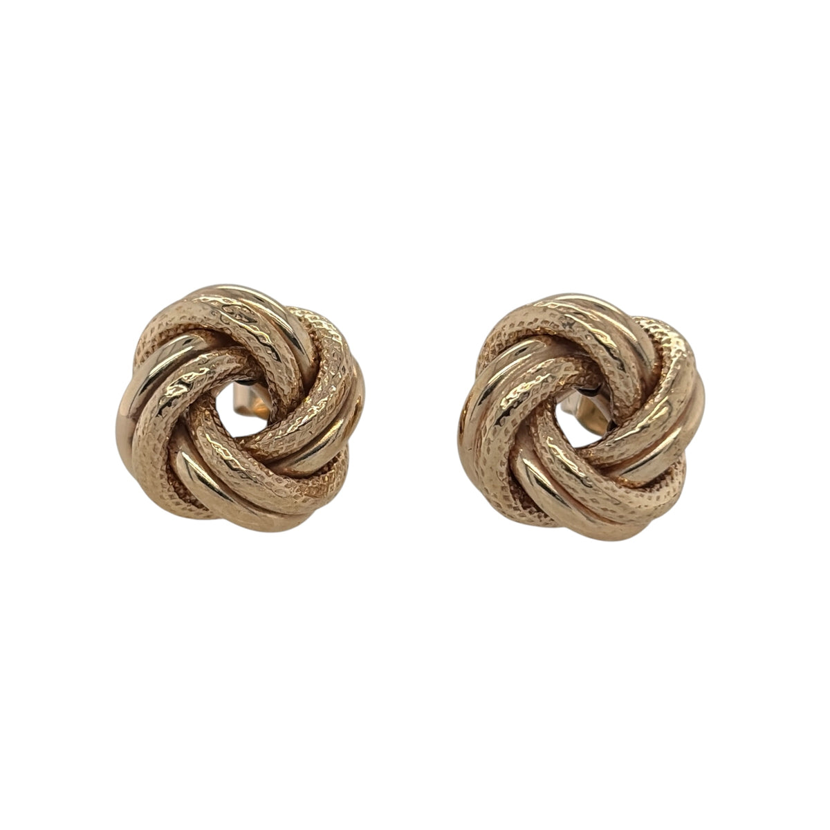 This pre-owned 9ct yellow gold knot stud earrings are a classic design, featuring an interwoven knot-style shape with a warm yellow gold finish.

Design: Featuring a traditional knot design, these stud earrings have an interwoven appearance that creates a simple yet decorative finish.
Material: Made from 9-carat yellow gold.
Earring Detail: Each knot stud measures approximately 13mm.
Size &amp; Weight: Total weight 2.40 grams.