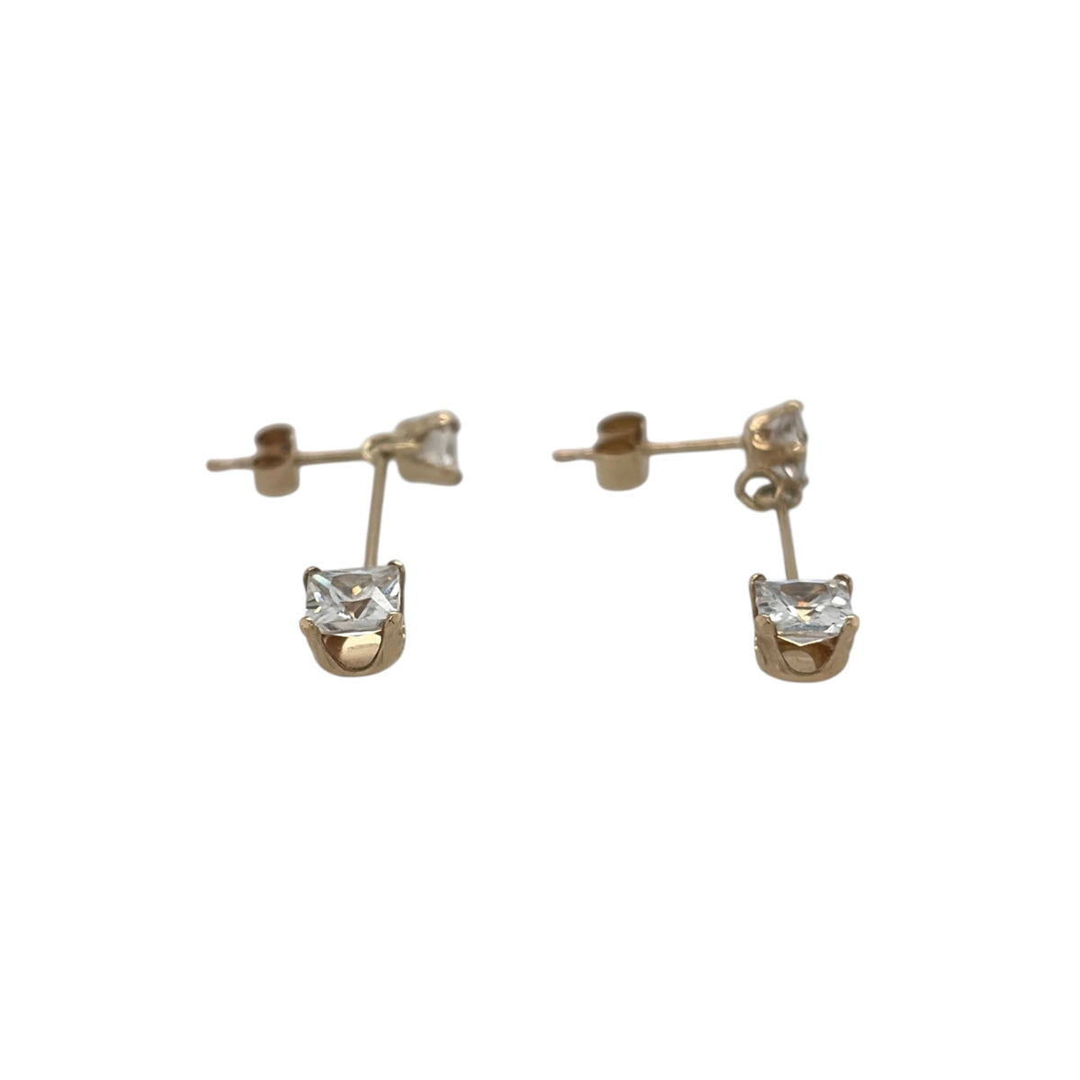 This pre-owned 9ct yellow gold cubic zirconia drop earrings are an elegant design, each featuring two square cubic zirconia stones in a delicate drop setting.

Design: Featuring a drop design with two square cubic zirconia stones on each earring, these earrings are finished in warm 9ct yellow gold.
Material: Made from 9-carat yellow gold.
Gemstone Detail: Each earring is set with two square cubic zirconia stones, with the lower stones measuring approximately 4mm by 4mm.