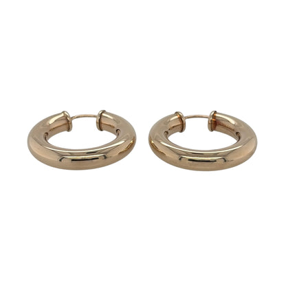 This pre-owned 9ct yellow gold plain hoop creole earrings are a classic design, featuring a simple rounded profile with a polished finish.

Design: Featuring a traditional plain hoop creole design, these earrings have a smooth profile finished in warm 9ct yellow gold.
Material: Made from 9-carat yellow gold.
Earring Detail: Each hoop measures approximately 26mm in diameter.
Size & Weight: Total weight 3.30 grams.