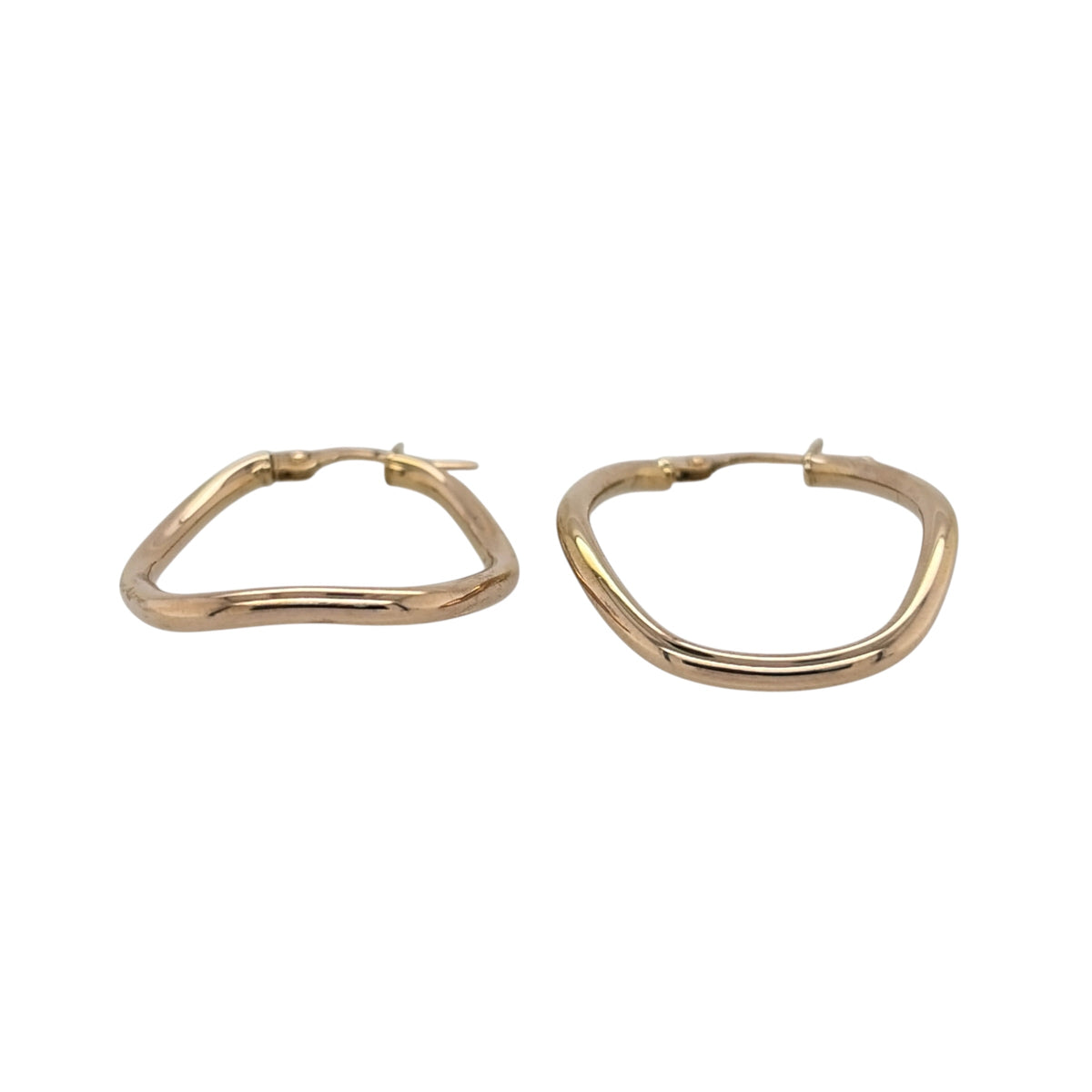 This pre-owned 9ct yellow gold funky shaped oval creole earrings are a distinctive design, featuring an unusual oval profile for a modern take on classic creoles.

Design: Featuring a funky shaped oval design, these creole earrings have a distinctive curved profile finished in warm 9ct yellow gold.
Material: Made from 9-carat yellow gold.
Earring Detail: Each creole measures approximately 30mm by 24mm.
Size & Weight: Total weight 1.50 grams.