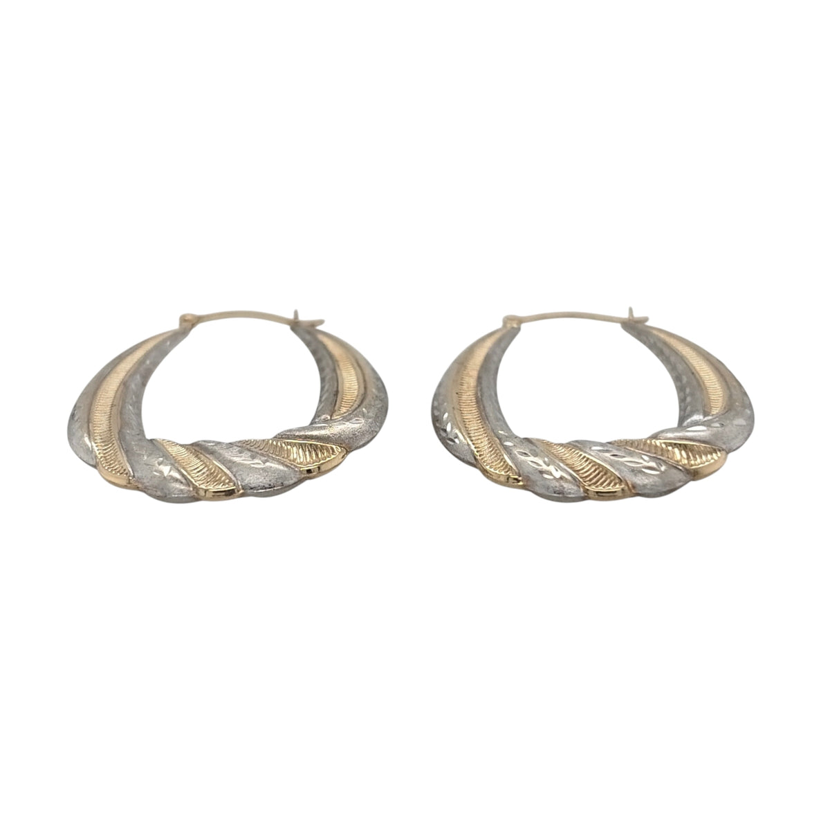 This pre-owned 9ct yellow and white gold brushed effect patterned twisted oval creole earrings are a distinctive two-tone design, featuring decorative detailing and a textured finish.

Design: Featuring a twisted oval creole design with patterned detailing and a brushed effect finish, these earrings combine contrasting yellow and white gold for a two-tone appearance.
Material: Made from 9-carat yellow and white gold.
Earring Detail: Each creole measures approximately 35mm by 27mm.