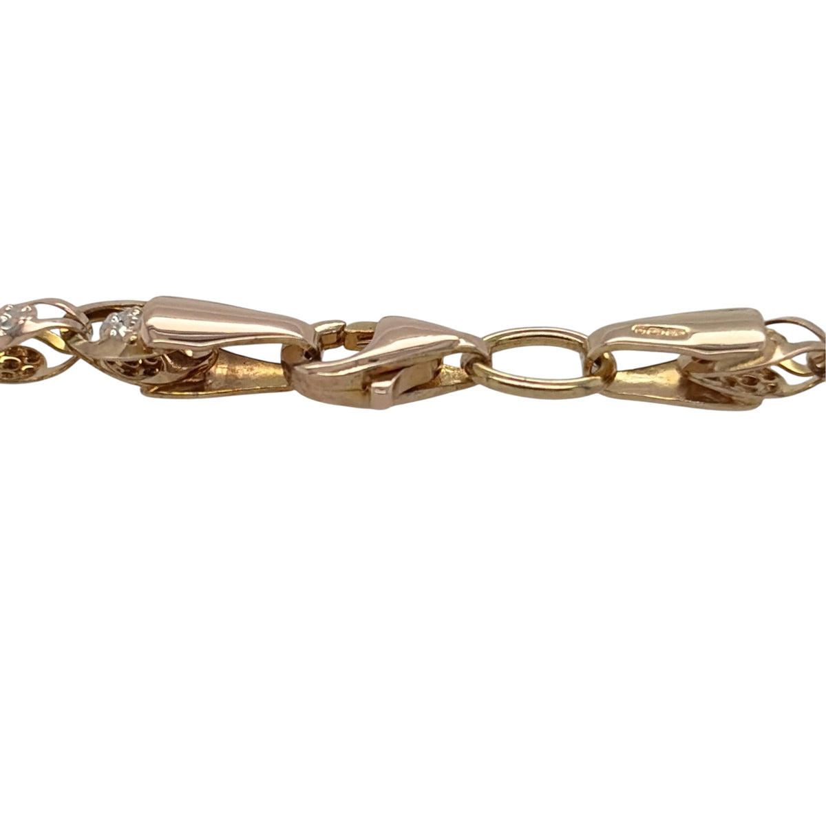 This pre-owned 9ct yellow and white gold flower-style bracelet is a decorative two-tone design, featuring floral-inspired links throughout.

Design: Featuring a flower-style link design, this bracelet combines warm yellow gold with contrasting white gold detailing for a decorative two-tone appearance.
Material: Made from 9-carat yellow and white gold.
Bracelet Detail: The flower-style links measure approximately 4mm wide.
