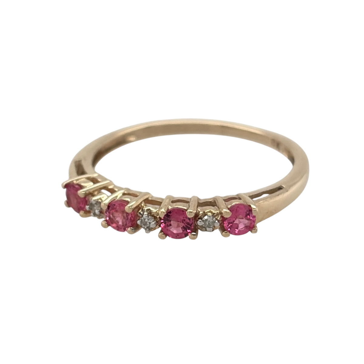 This pre-owned 9ct yellow gold diamond and pink stone band ring is a colourful design, featuring contrasting pink stones and diamond detailing across the front.

Design: Featuring a classic gemstone band design, this ring combines round pink stones with diamond detailing in warm 9ct yellow gold.
Material: Made from 9-carat yellow gold.
Gemstone Detail: Set with round pink stones measuring approximately 3mm in diameter each, complemented by diamond detailing.