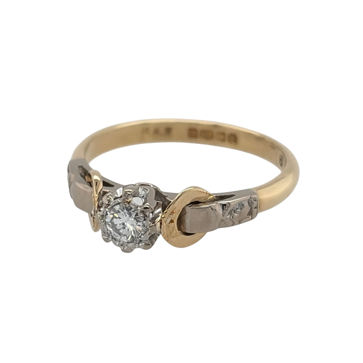This pre-owned 18ct yellow gold diamond solitaire ring is a timeless design, featuring a brilliant cut diamond as the central focus.

Design: Featuring a classic solitaire design, this ring showcases a single brilliant cut diamond set in warm 18ct yellow gold.
Material: Made from 18-carat yellow gold.
Gemstone Detail: Set with a brilliant cut diamond weighing approximately 0.15ct.
Ring Detail: Classic solitaire setting designed to showcase the central diamond.