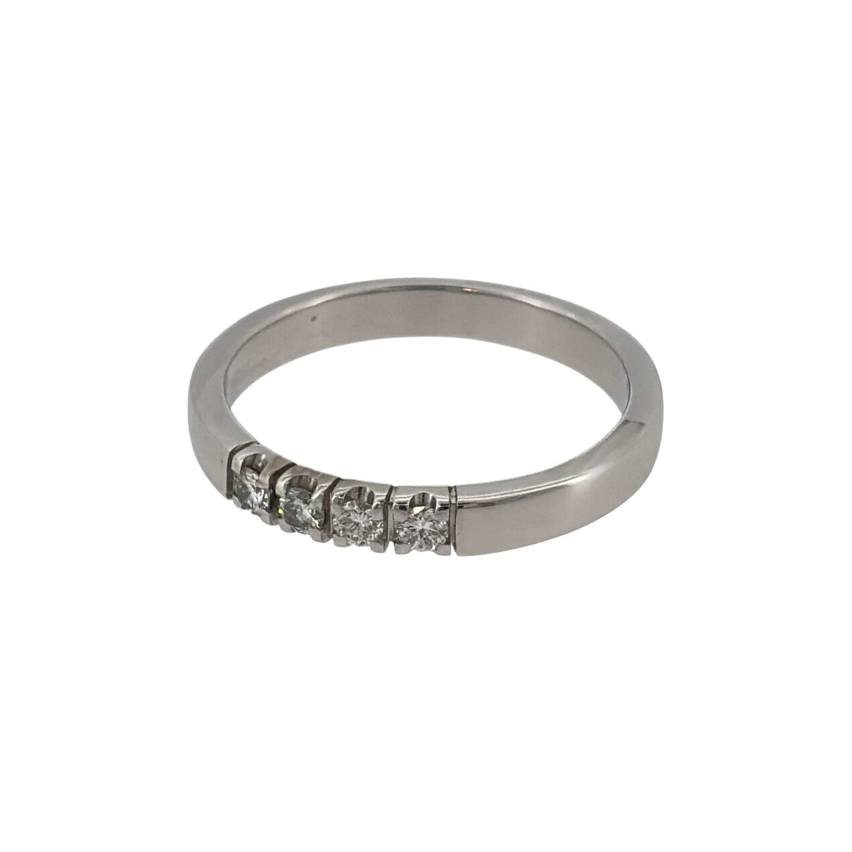 This pre-owned 14ct white gold diamond four stone band ring is a classic design, featuring four diamonds set across the front of the band.

Design: Featuring a four stone diamond design, this ring has a simple band profile finished in polished 14ct white gold.
Material: Made from 14-carat white gold.
Gemstone Detail: Set with four diamonds across the front of the ring.
Ring Detail: The front of the band measures approximately 3mm wide.
Size & Weight: Ring size M. Total weight 3.30 grams.