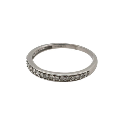 This pre-owned 9ct white gold diamond band ring is a classic design, featuring diamond detailing across the front of a slim band.

Design: Featuring a simple diamond-set band design, this ring has a slim profile finished in polished 9ct white gold.
Material: Made from 9-carat white gold.
Gemstone Detail: Set with diamonds across the front of the band.
Ring Detail: The front of the band measures approximately 2mm wide.
Size & Weight: Ring size O. Total weight 1.60 grams.
