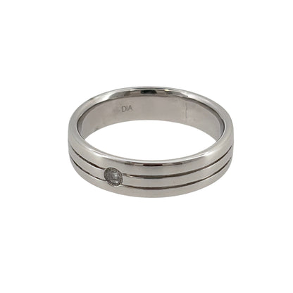 This pre-owned 9ct white gold diamond band ring is a classic design, featuring a single brilliant cut diamond set into a wider band.

Design: Featuring a simple band design with a single diamond as the focal point, this ring has a clean profile finished in polished 9ct white gold.
Material: Made from 9-carat white gold.
Gemstone Detail: Set with one brilliant cut diamond within the band.
Ring Detail: The band measures approximately 5mm wide.
Size & Weight: Ring size N. Total weight 4.50 grams.