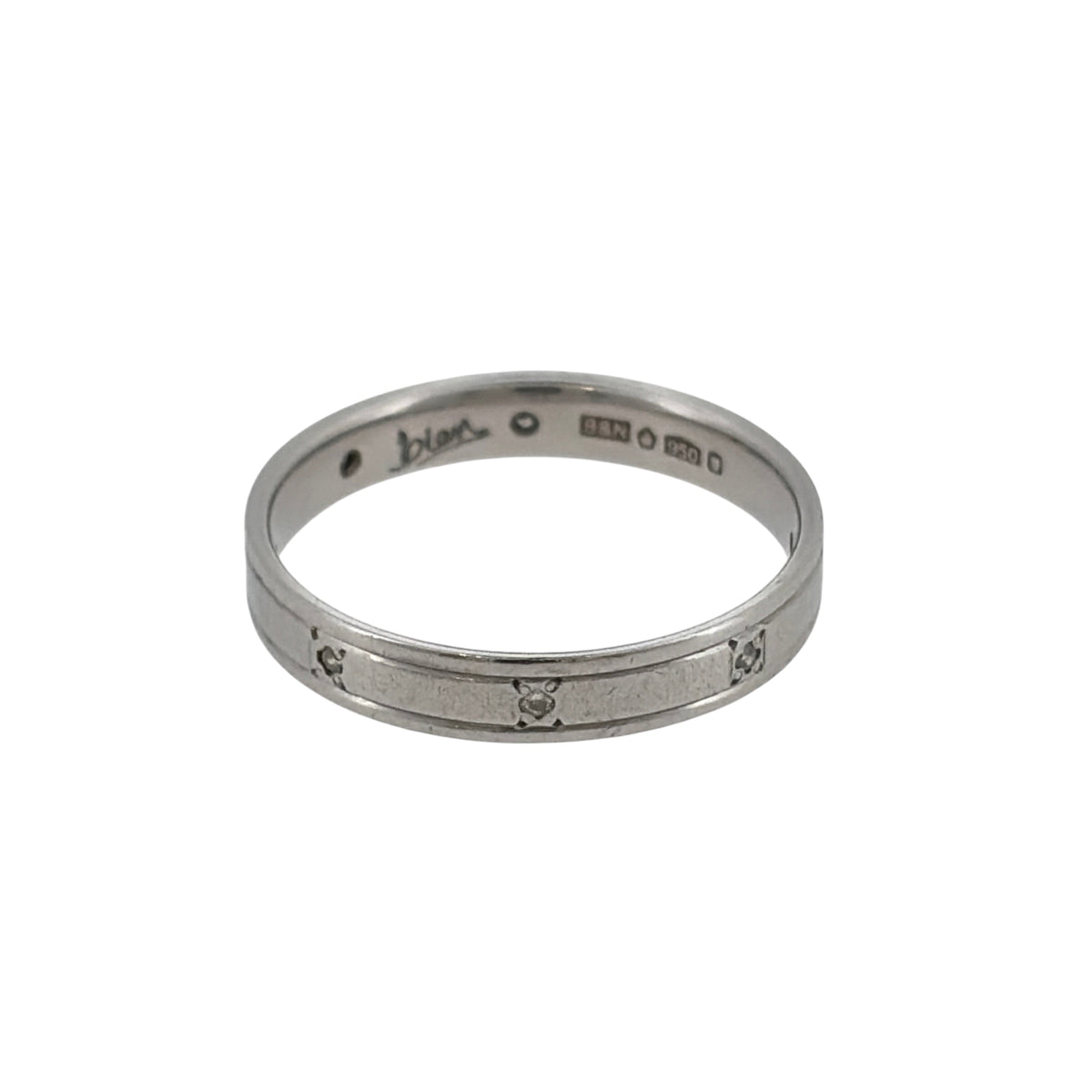 This pre-owned platinum diamond band ring is a timeless design, featuring eight diamonds set evenly around the band.

Design: Featuring a classic diamond-set band design, this ring has eight diamonds spaced equally around the platinum band for a balanced finish.
Material: Made from platinum.
Gemstone Detail: Set with eight diamonds positioned evenly around the band.
Ring Detail: The band measures approximately 3mm wide.
Size & Weight: Ring size L. Total weight 3 grams.