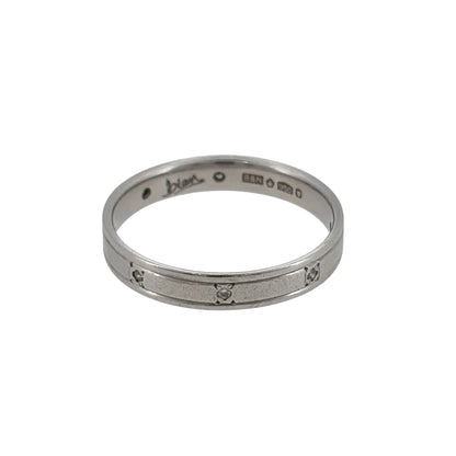 This pre-owned platinum diamond band ring is a timeless design, featuring eight diamonds set evenly around the band.

Design: Featuring a classic diamond-set band design, this ring has eight diamonds spaced equally around the platinum band for a balanced finish.
Material: Made from platinum.
Gemstone Detail: Set with eight diamonds positioned evenly around the band.
Ring Detail: The band measures approximately 3mm wide.
Size & Weight: Ring size L. Total weight 3 grams.