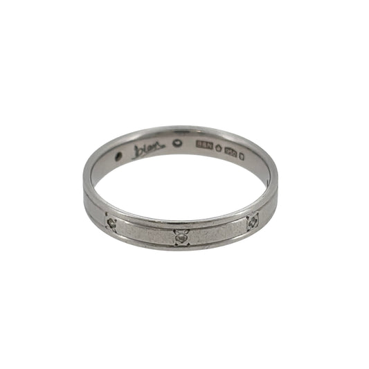 This pre-owned platinum diamond band ring is a timeless design, featuring eight diamonds set evenly around the band.

Design: Featuring a classic diamond-set band design, this ring has eight diamonds spaced equally around the platinum band for a balanced finish.
Material: Made from platinum.
Gemstone Detail: Set with eight diamonds positioned evenly around the band.
Ring Detail: The band measures approximately 3mm wide.
Size & Weight: Ring size L. Total weight 3 grams.