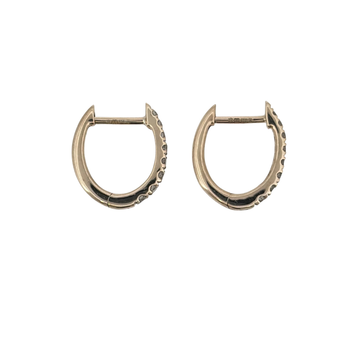 This pre-owned 9ct yellow gold diamond oval huggie earrings are a classic design, featuring diamond detailing within a compact oval profile.

Design: Featuring an oval huggie design, these earrings have a close-fitting profile finished in warm 9ct yellow gold with diamond detailing.
Material: Made from 9-carat yellow gold.
Gemstone Detail: Set with diamonds across the oval huggie design.
Earring Detail: Each earring measures approximately 12mm long.
Size & Weight: Total weight 1.40 grams.