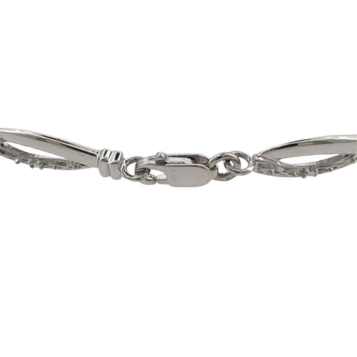 This pre-owned 9ct white gold diamond link bracelet is a classic design, featuring decorative links with diamond detailing throughout.

Design: Featuring a linked bracelet design with diamond detailing, this bracelet has a polished finish in 9ct white gold.
Material: Made from 9-carat white gold.
Gemstone Detail: Set with diamonds within the link design.
Bracelet Detail: The links measure approximately 5.5mm wide.
Size & Weight: Bracelet measures approximately 7.5 inches long. Total weight 4 grams.