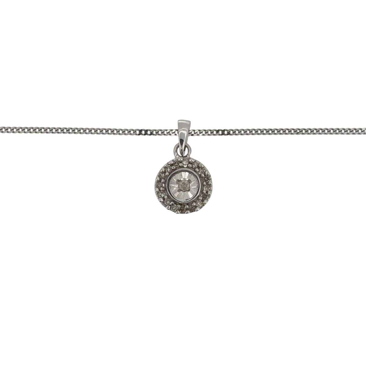 This pre-owned 9ct white gold illusion diamond cluster pendant necklace is a classic design, featuring diamond detailing arranged to create the appearance of a larger cluster.

Design: Featuring an illusion cluster design, this pendant has multiple diamonds arranged together to create the appearance of a larger diamond centrepiece, finished in polished 9ct white gold.
Material: Made from 9-carat white gold.
Gemstone Detail: Set with multiple diamonds in an illusion-style cluster setting.