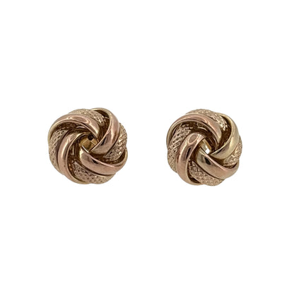 This pre-owned 9ct yellow gold knot stud earrings are a classic design, featuring an interwoven knot-style shape with a warm yellow gold finish.
Design: Featuring a traditional knot design, these stud earrings have an interwoven appearance that creates a simple yet decorative finish.
Material: Made from 9-carat yellow gold.
Earring Detail: Each knot stud measures approximately 12mm.