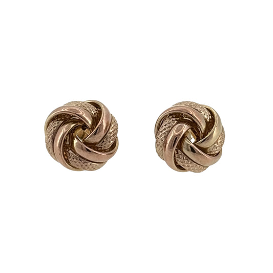 This pre-owned 9ct yellow gold knot stud earrings are a classic design, featuring an interwoven knot-style shape with a warm yellow gold finish.
Design: Featuring a traditional knot design, these stud earrings have an interwoven appearance that creates a simple yet decorative finish.
Material: Made from 9-carat yellow gold.
Earring Detail: Each knot stud measures approximately 12mm.