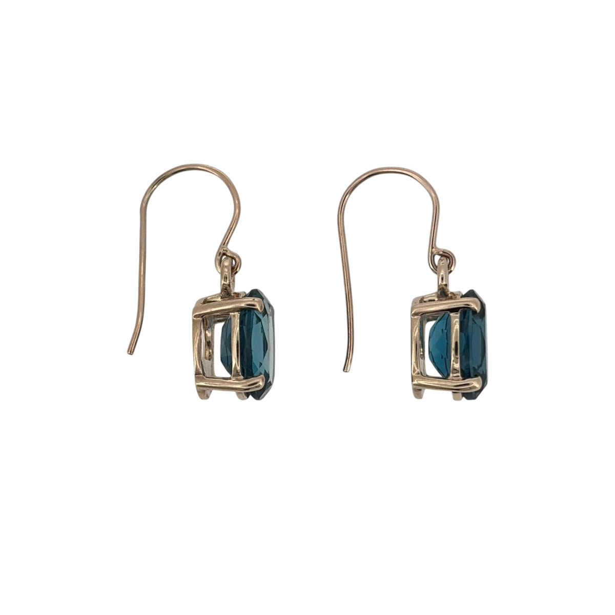 This pre-owned 9ct yellow gold blue topaz drop earrings are a classic gemstone design, featuring oval blue topaz stones suspended from warm yellow gold settings.
Design: Featuring a traditional drop design, these earrings showcase oval blue topaz stones finished in warm 9ct yellow gold.
Material: Made from 9-carat yellow gold.
Gemstone Detail: Each earring is set with an oval blue topaz measuring approximately 9mm by 7mm.
Earring Detail: Drop-style design created to showcase the blue topaz stones.