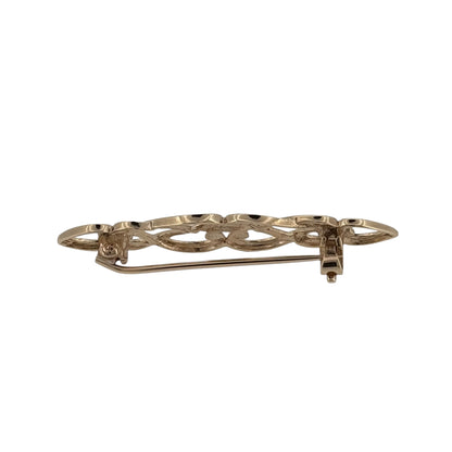 This pre-owned 9ct yellow gold open patterned brooch is a decorative design, featuring intricate open detailing with a warm yellow gold finish.
Design: Featuring an open patterned design, this brooch has a decorative elongated profile finished in warm 9ct yellow gold.
Material: Made from 9-carat yellow gold.
Brooch Detail: The brooch measures approximately 40mm by 10mm.
Size & Weight: Total weight 2.30 grams.