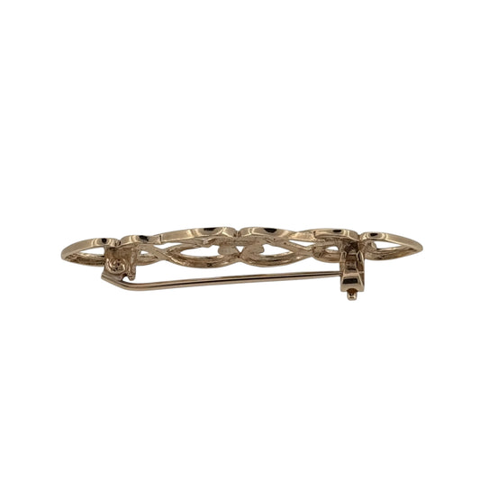 This pre-owned 9ct yellow gold open patterned brooch is a decorative design, featuring intricate open detailing with a warm yellow gold finish.
Design: Featuring an open patterned design, this brooch has a decorative elongated profile finished in warm 9ct yellow gold.
Material: Made from 9-carat yellow gold.
Brooch Detail: The brooch measures approximately 40mm by 10mm.
Size & Weight: Total weight 2.30 grams.