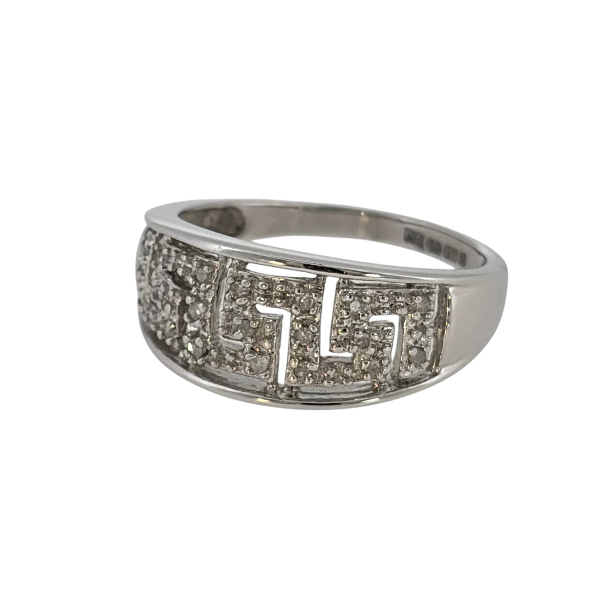 This pre-owned 9ct white gold diamond Greek key band ring is a distinctive design, featuring the classic geometric Greek key pattern with diamond detailing.
Design: Featuring a traditional Greek key pattern across the front, this wide band ring combines geometric detailing with diamonds and a polished 9ct white gold finish.
Material: Made from 9-carat white gold.
Gemstone Detail: Set with diamonds within the Greek key design.
Ring Detail: The front of the band measures approximately 9mm wide.