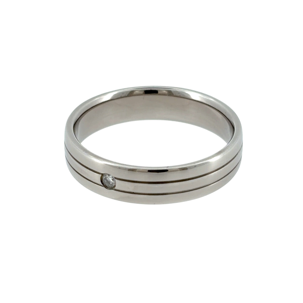 This pre-owned 9ct white gold diamond band ring is a classic design, featuring a single brilliant cut diamond set into a wider band.

Design: Featuring a simple band design with a single diamond as the focal point, this ring has a clean profile finished in polished 9ct white gold.
Material: Made from 9-carat white gold.
Gemstone Detail: Set with one brilliant cut diamond within the band.
Ring Detail: The band measures approximately 5mm wide.
Size &amp; Weight: Ring size S. Total weight 5.30 grams.