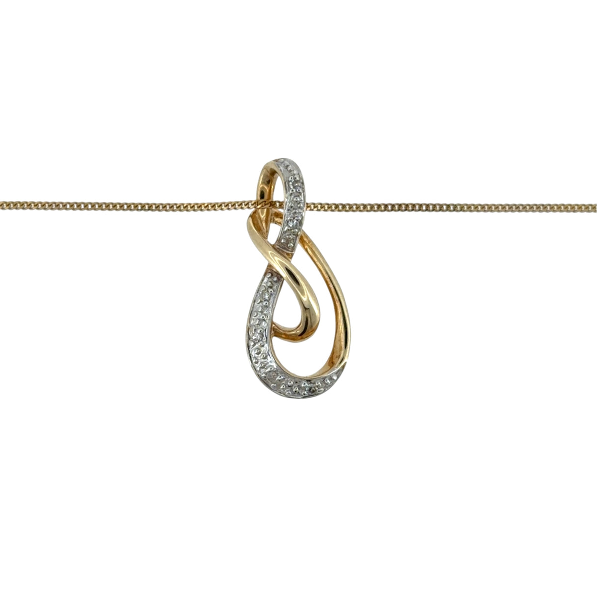 This pre-owned 9ct yellow and white gold diamond infinity style pendant necklace is a classic two-tone design, featuring flowing curves with diamond detailing.
Design: Featuring an infinity-inspired design, this pendant combines polished yellow and white gold with diamond detailing for a contrasting two-tone finish.
Material: Made from 9-carat yellow and white gold.
Gemstone Detail: Set with diamonds within the infinity style design.
Pendant Detail: The pendant measures approximately 20mm by 9mm.