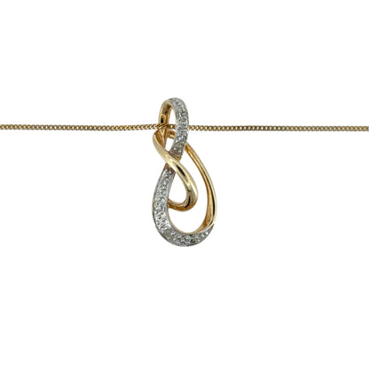 This pre-owned 9ct yellow and white gold diamond infinity style pendant necklace is a classic two-tone design, featuring flowing curves with diamond detailing.
Design: Featuring an infinity-inspired design, this pendant combines polished yellow and white gold with diamond detailing for a contrasting two-tone finish.
Material: Made from 9-carat yellow and white gold.
Gemstone Detail: Set with diamonds within the infinity style design.
Pendant Detail: The pendant measures approximately 20mm by 9mm.