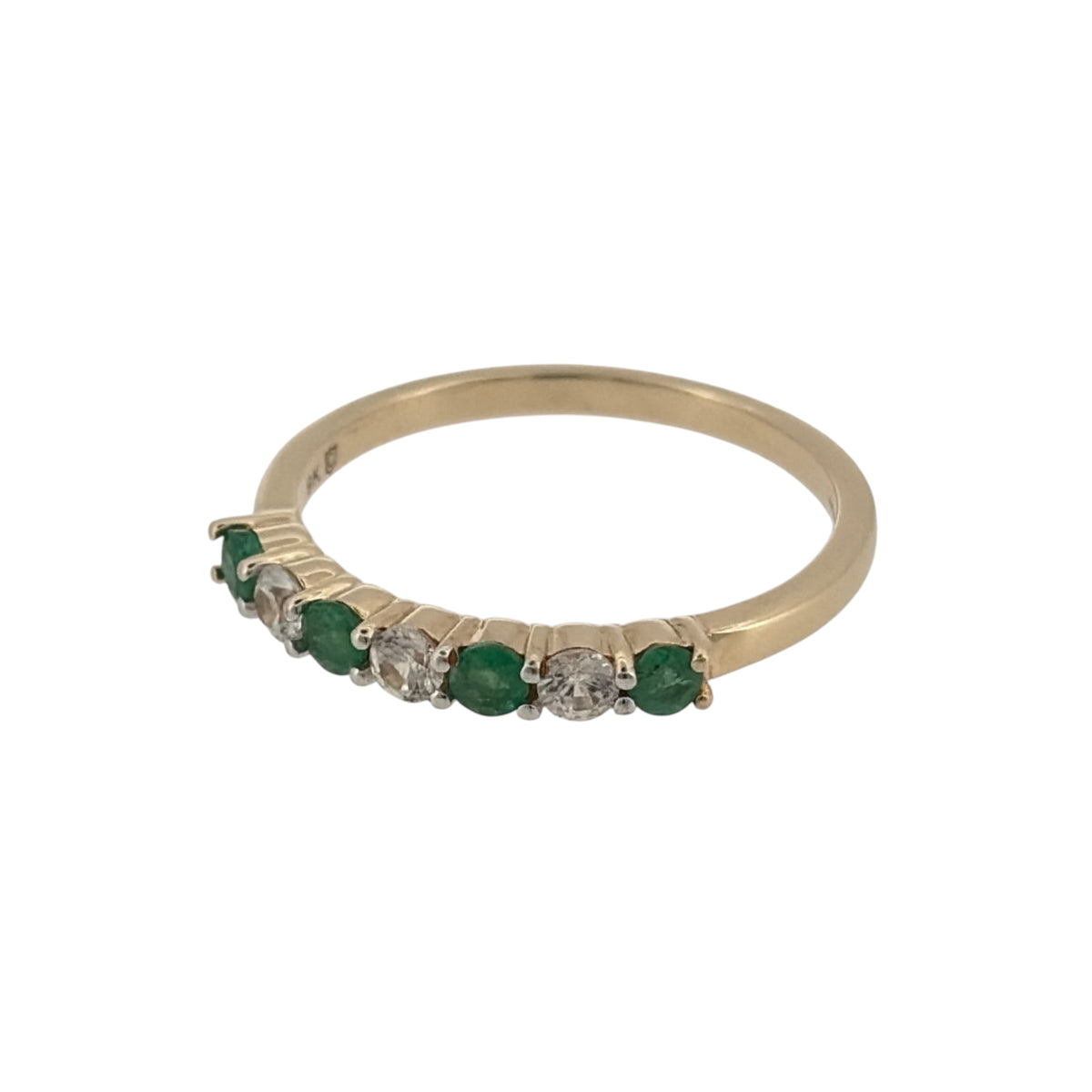 Add a touch of colour to your jewellery collection with this pre-owned 9ct yellow gold green stone and cubic zirconia band ring, combining rich green tones with bright clear stones in a classic, wearable design.

Design: The ring features a band-style design decorated with alternating green stones and cubic zirconia, each measuring approximately 2.5mm in diameter for a balanced and attractive finish.