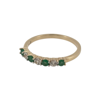 Add a touch of colour to your jewellery collection with this pre-owned 9ct yellow gold green stone and cubic zirconia band ring, combining rich green tones with bright clear stones in a classic, wearable design.

Design: The ring features a band-style design decorated with alternating green stones and cubic zirconia, each measuring approximately 2.5mm in diameter for a balanced and attractive finish.