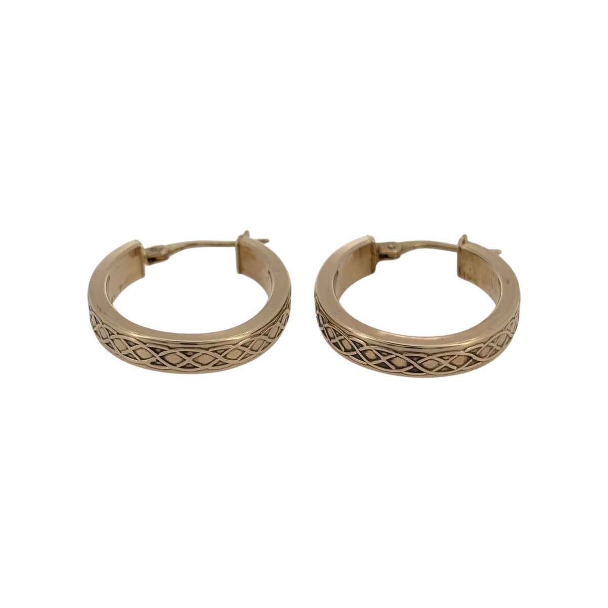 Add traditional Celtic-inspired detail to your jewellery collection with these pre-owned 9ct yellow gold oval Celtic weave creole earrings, featuring an intricate woven design and a classic hoop-style shape.

Design: The earrings feature an oval creole design with decorative Celtic weave detailing, creating an eye-catching pattern with traditional character and timeless appeal.
