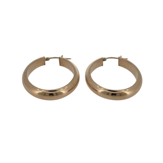 Complete your jewellery collection with these pre-owned 9ct yellow gold plain oval creole earrings, featuring a simple polished design and a larger profile for a timeless everyday look.

Design: The earrings feature a classic oval creole shape with a plain finish, creating a clean and versatile design that pairs easily with a wide range of jewellery.
Material: Made from 9-carat yellow gold, the warm polished finish gives these earrings a traditional and timeless appearance.