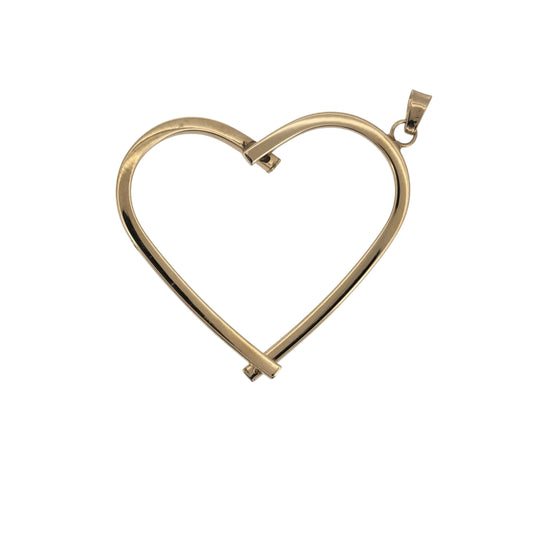 Add a timeless symbol of love to your jewellery collection with this pre-owned 9ct yellow gold heart pendant, featuring a classic heart-shaped design with a lightweight and elegant finish.

Design: The pendant features a classic heart shape, creating a simple yet eye-catching design that can be worn for everyday styling or special occasions.
Material: Made from 9-carat yellow gold, the warm gold tone gives this heart pendant a traditional and versatile appearance.