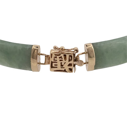 Add rich natural colour to your jewellery collection with this pre-owned 9ct yellow gold and jade bracelet, featuring elongated jade stones complemented by warm yellow gold for a distinctive and timeless look.
Design: The bracelet features a series of elongated jade stones linked together with yellow gold, creating an eye-catching gemstone design with a classic and elegant appearance.
Material: Made from 9-carat yellow gold, the warm gold tone beautifully complements the natural green colouring of the jade.