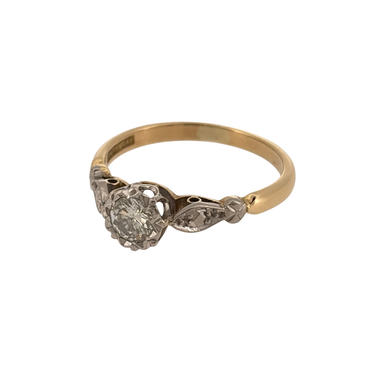Discover timeless vintage styling with this pre-owned 18ct yellow gold and platinum diamond solitaire ring, featuring a brilliant-cut diamond in a classic single-stone design.

Design: The ring features a traditional vintage solitaire design with a brilliant-cut diamond taking centre stage, creating an elegant and enduring look.
Material: Made from 18-carat yellow gold and platinum, the warm yellow gold band contrasts beautifully with the platinum setting surrounding the diamond.