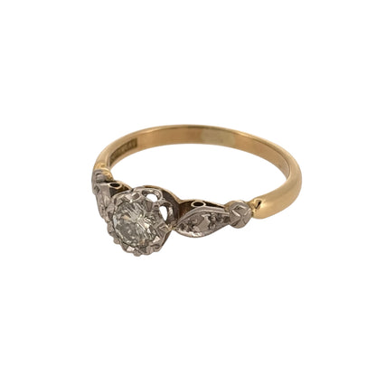Discover timeless vintage styling with this pre-owned 18ct yellow gold and platinum diamond solitaire ring, featuring a brilliant-cut diamond in a classic single-stone design.

Design: The ring features a traditional vintage solitaire design with a brilliant-cut diamond taking centre stage, creating an elegant and enduring look.
Material: Made from 18-carat yellow gold and platinum, the warm yellow gold band contrasts beautifully with the platinum setting surrounding the diamond.