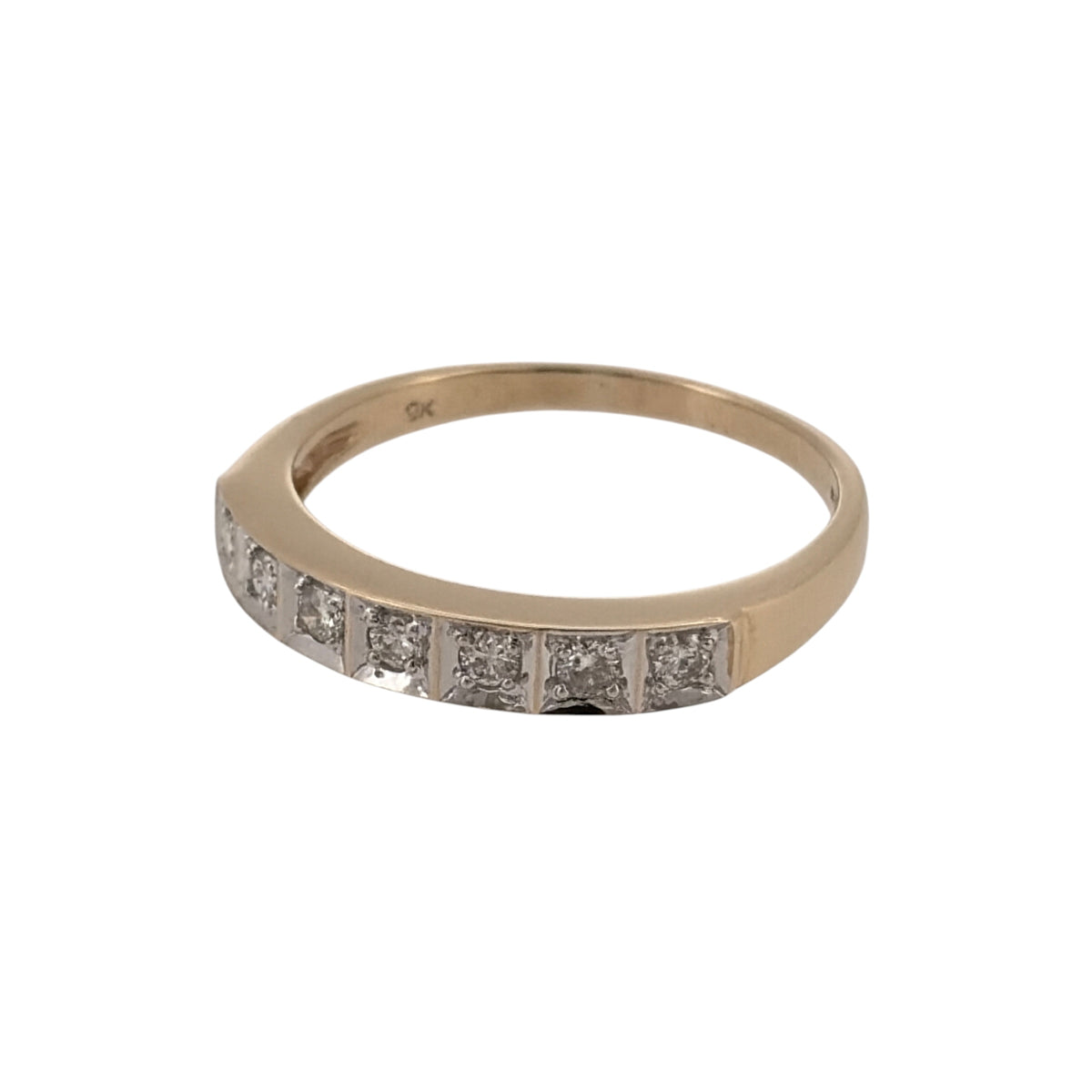 Add classic diamond detail to your jewellery collection with this pre-owned 9ct yellow gold diamond band ring, featuring seven brilliant-cut diamonds in a distinctive square-set design.

Design: The ring features a sleek band design with seven individual square settings arranged across the front, each containing a brilliant-cut diamond for a neat and balanced appearance.