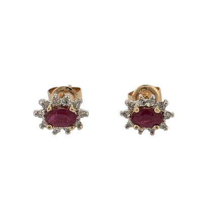 Add rich colour and classic gemstone styling to your jewellery collection with these pre-owned 9ct yellow gold diamond and ruby cluster stud earrings, featuring oval rubies surrounded by diamonds in a timeless design.

Design: Each stud features an oval ruby at the centre, framed by surrounding diamonds to create a classic cluster design with an elegant and eye-catching appearance.